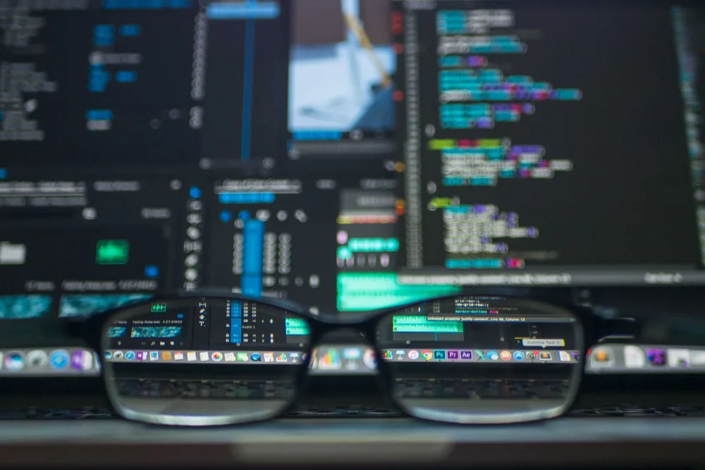 Server log data displayed on a computer screen used to identify AI crawler bots