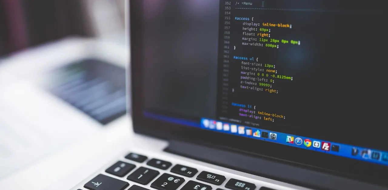 Laptop screen showing website code files
